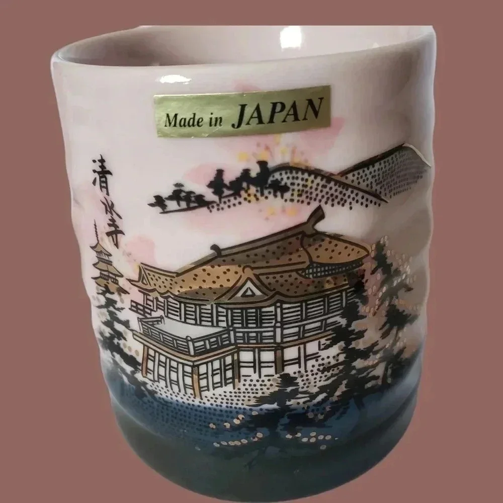 -Tea cup Japanese pottery pink and black